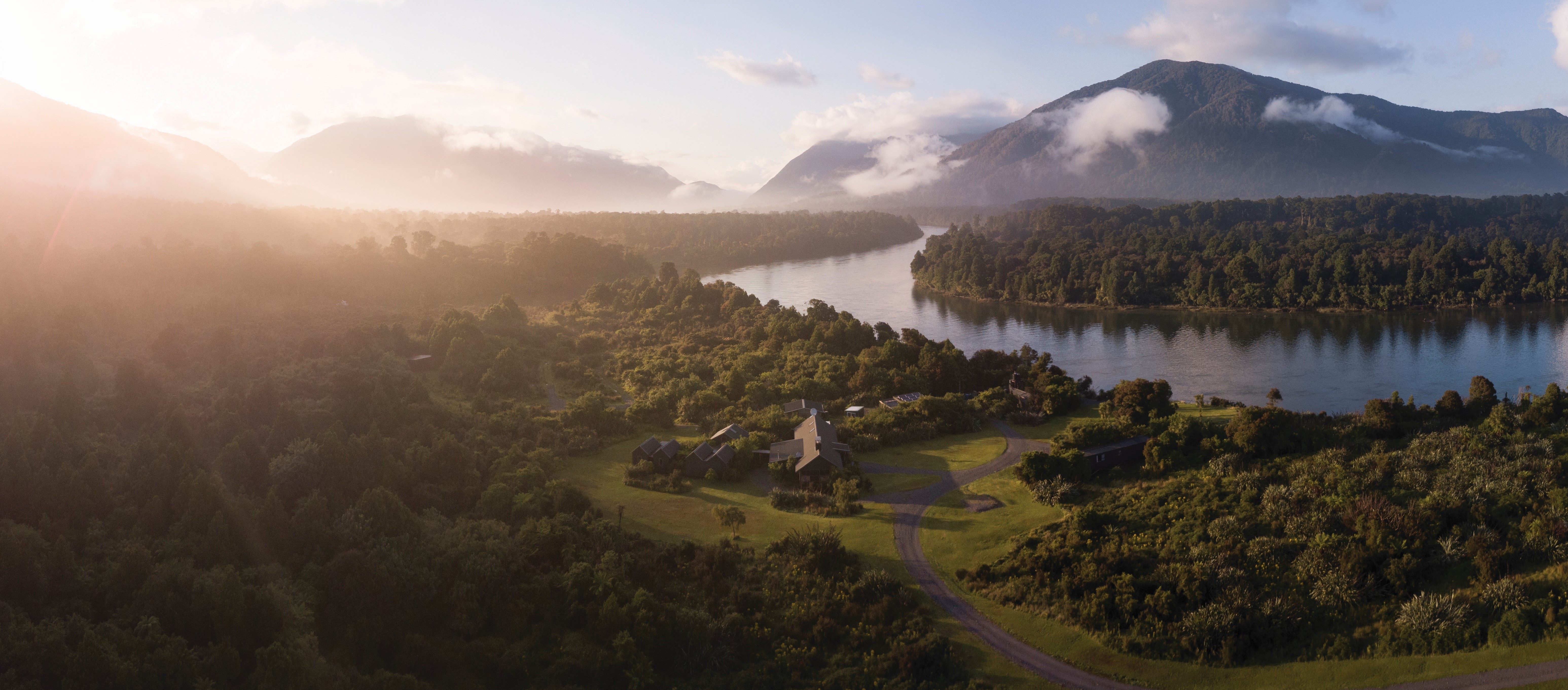 Aerial view of Martins Bay Lodge at sunset